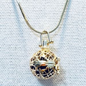 New. Golden Angel Chime necklace. 30” chain